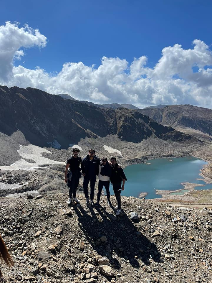 Trekking to alpine lake